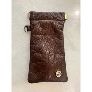 The Sak brown leather eye glass holder